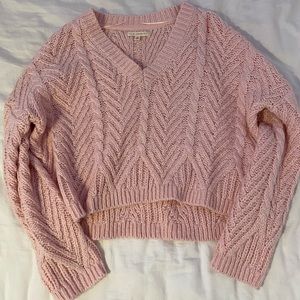 light pink cable knit sweater